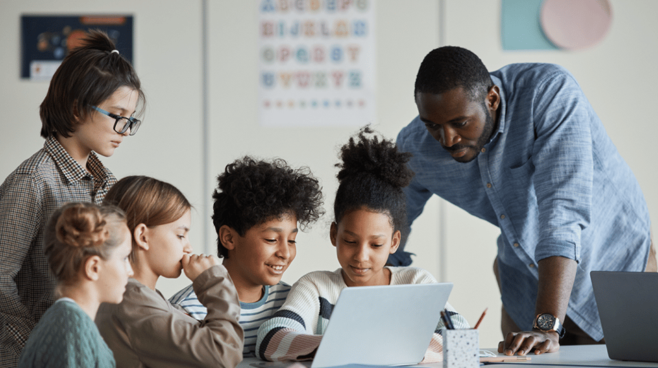 A safe environment with 3 educators in a meeting - interacting with each other